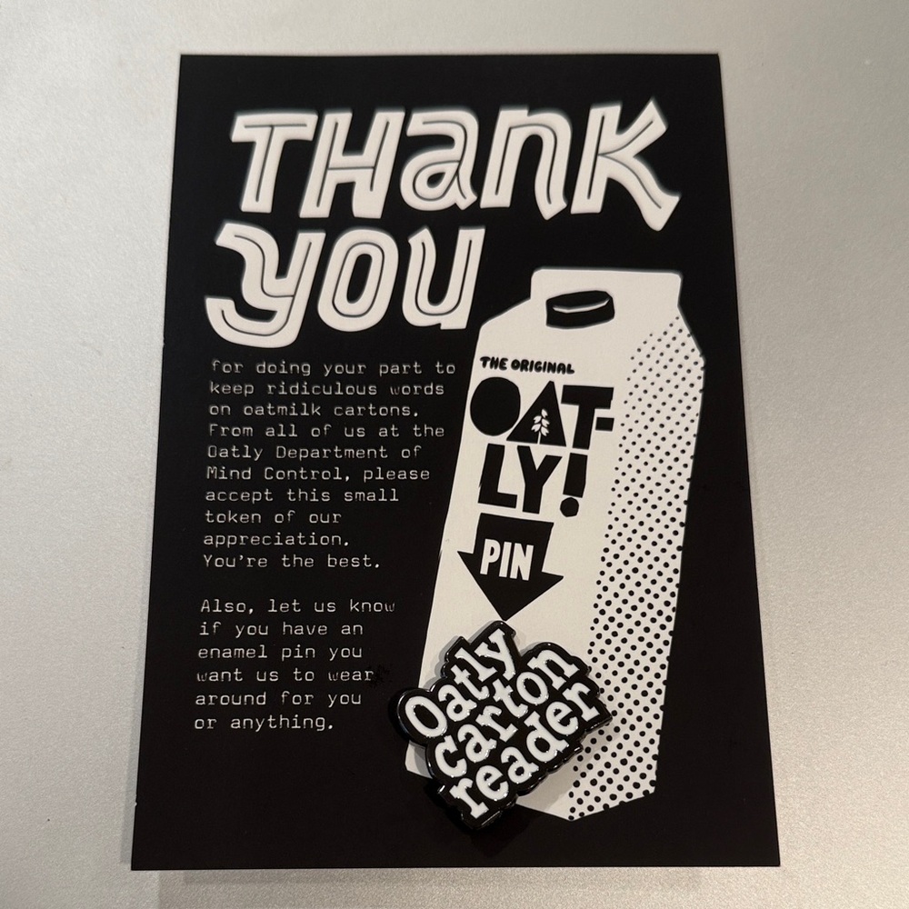 Oatly Oat Milk Carton Reader Pin